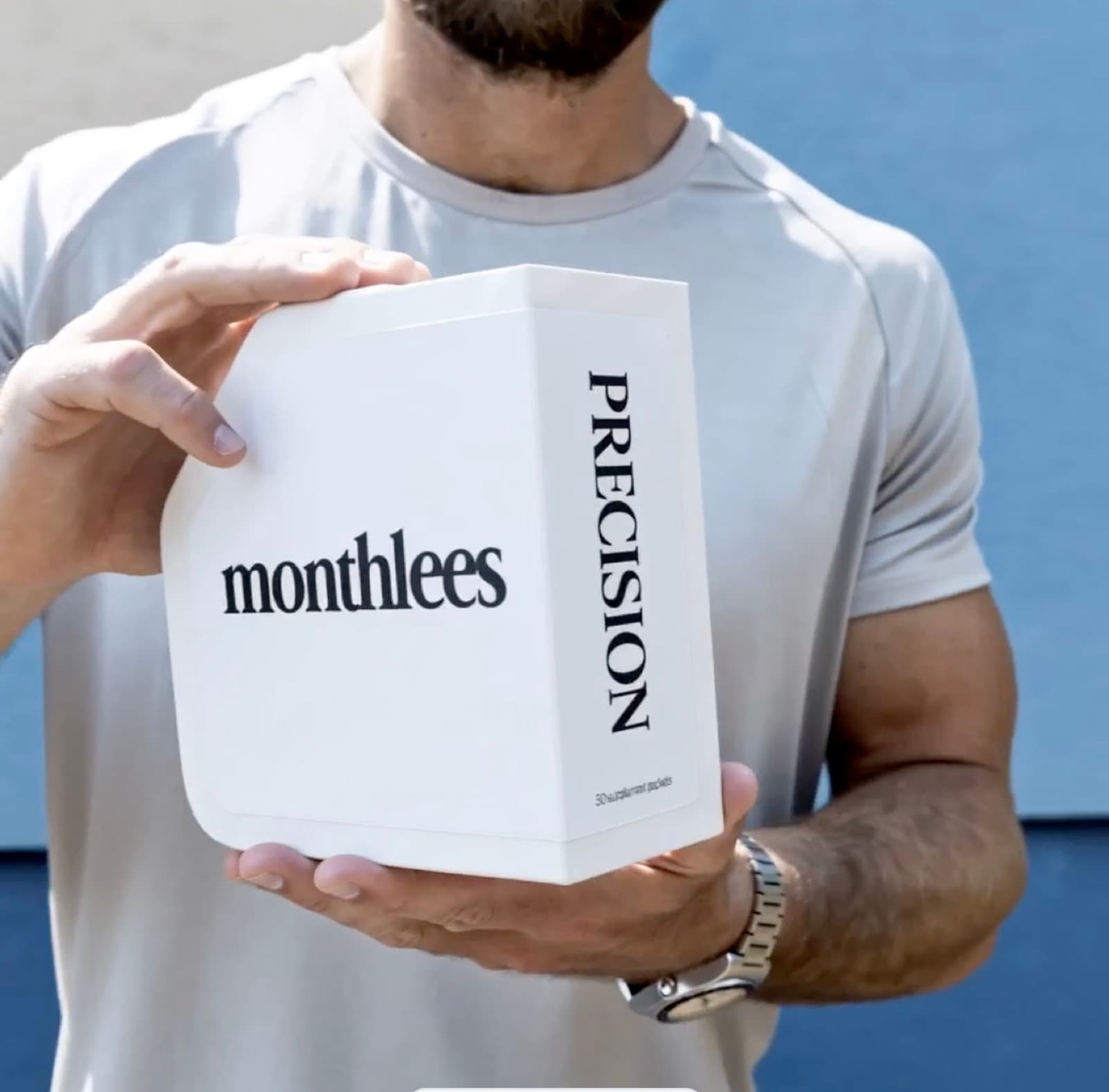 Christopher Walker holding a Monthlees Precision box
